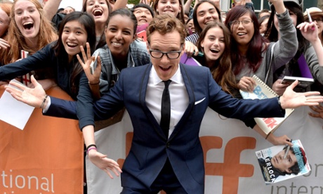 Benedict Cumberbatch poses with fans at The Imitation Game premiere.