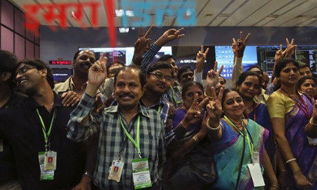 Indian Space Research Organisation scientists celebrate as the Mars mission successfully enters orbit.