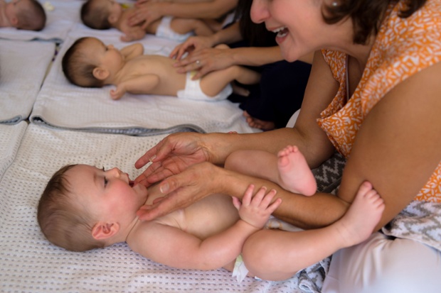 After the babies float for up to 20 minutes, parents give their baby a full body massage led by a certified infant massage instructor