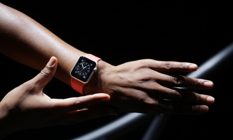 The new Apple Watch is shown by a model on a treadmill during a new product release on Tuesday, Sept. 9, 2014, in Cupertino, California