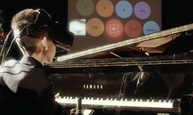 Disabled boy learns to play piano with his eyes using virtual-reality headset