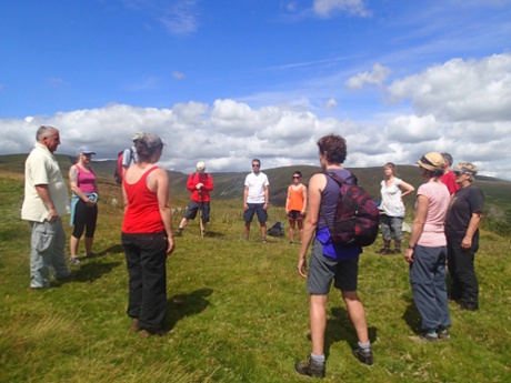 The group concentrates on some outdoor minfulness