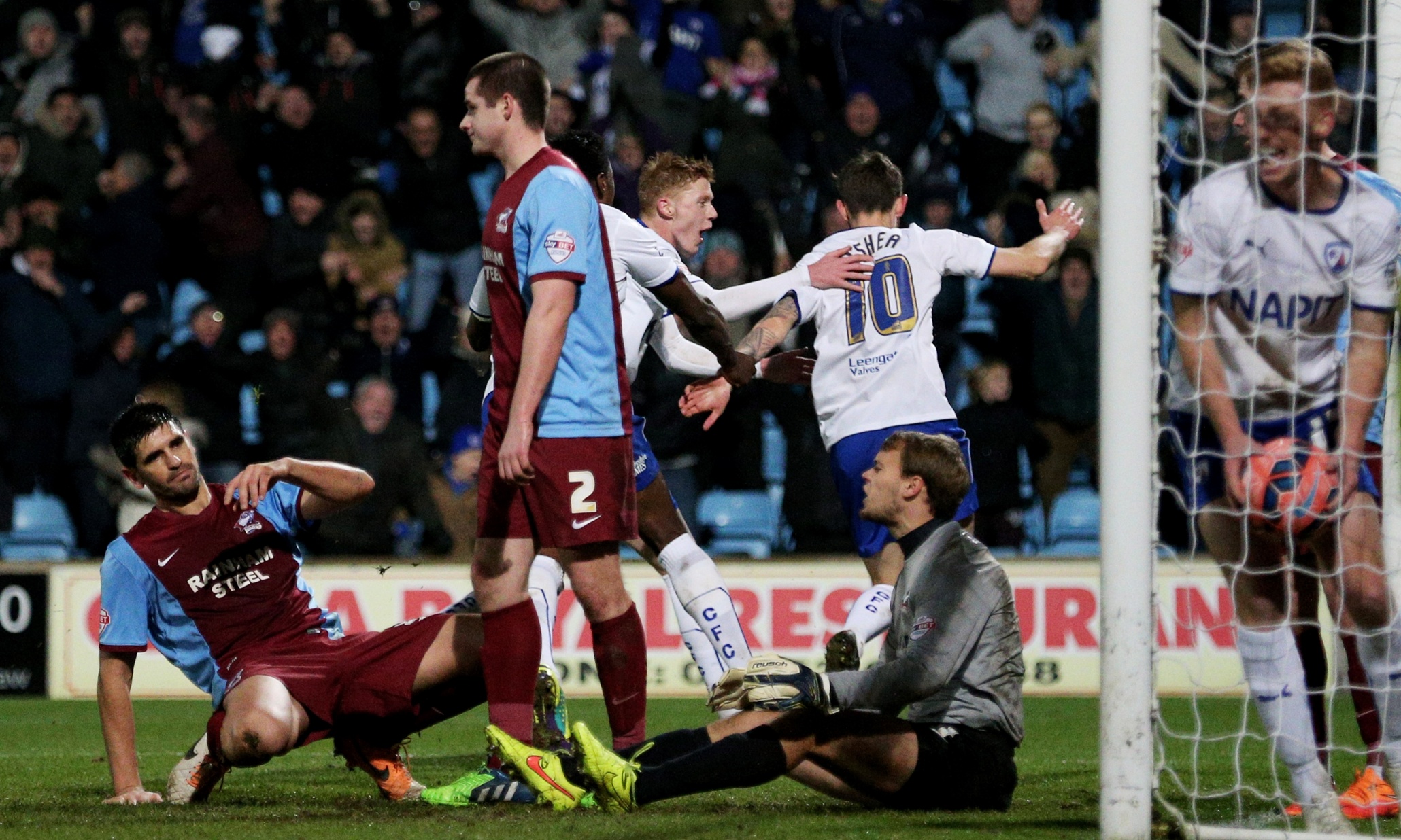 Chesterfield battle from two goals down against Scunthorpe to earn replay