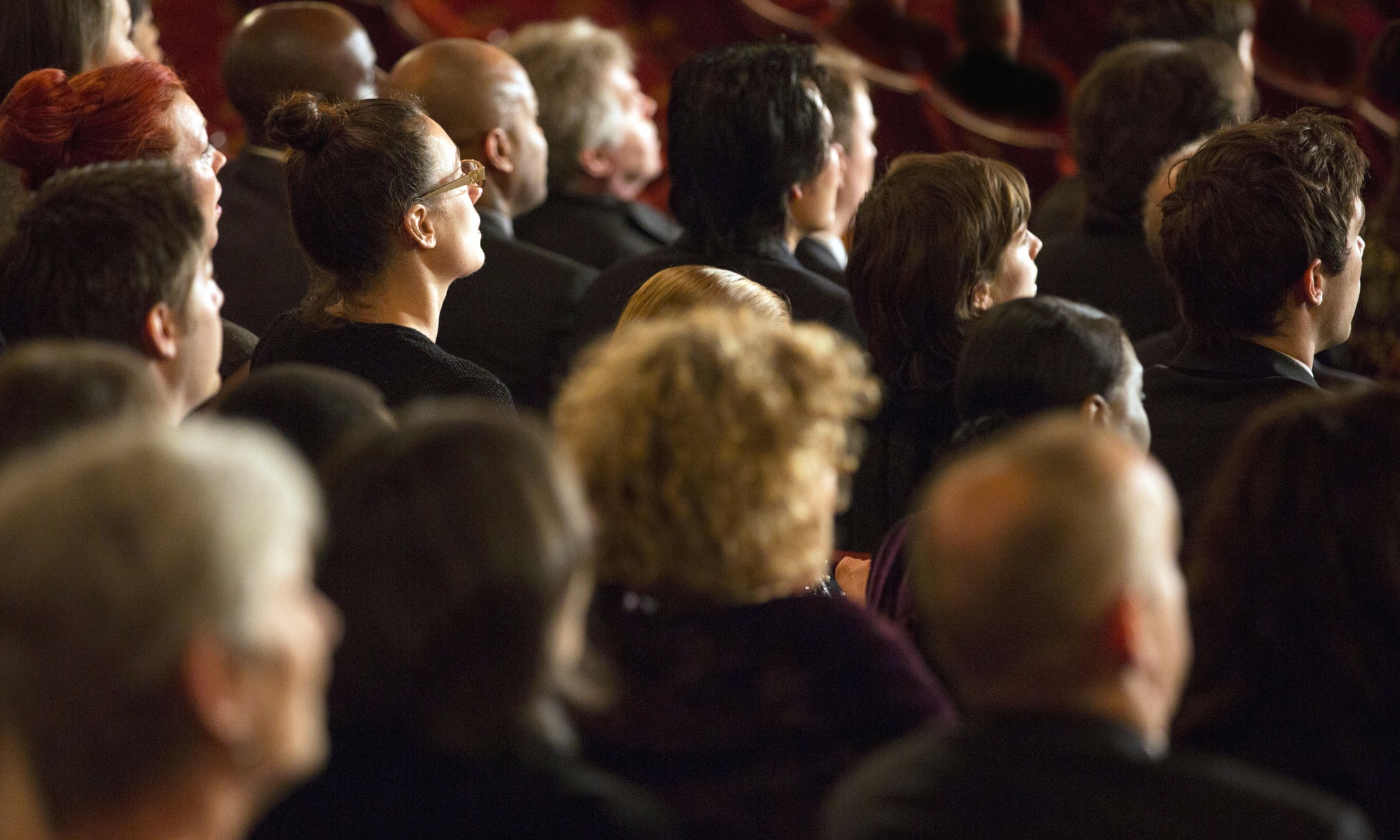 Put your phone away and be quiet in the theatre. Evolution demands it | Oliver Burkeman