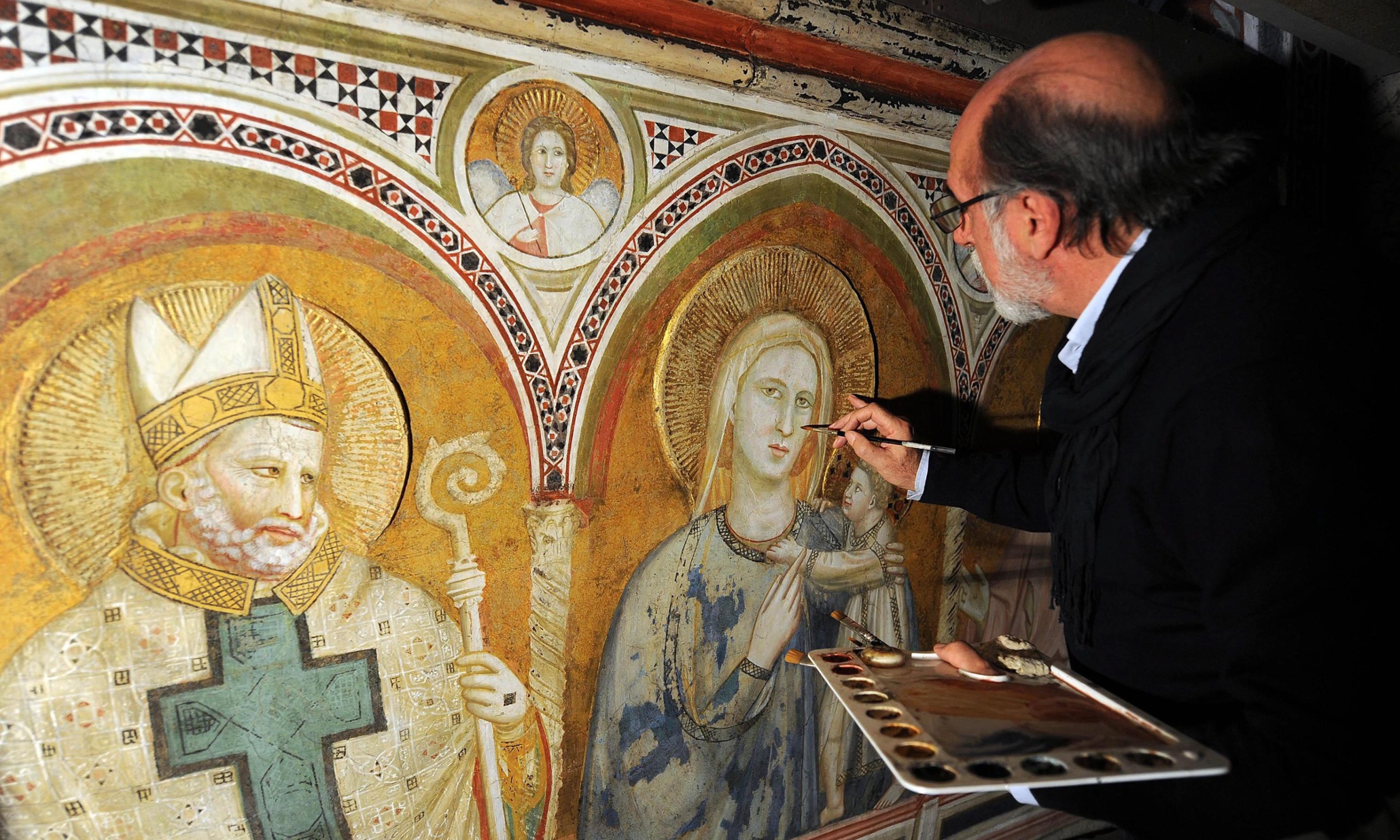 Italian art restorer denies damaging medieval frescoes