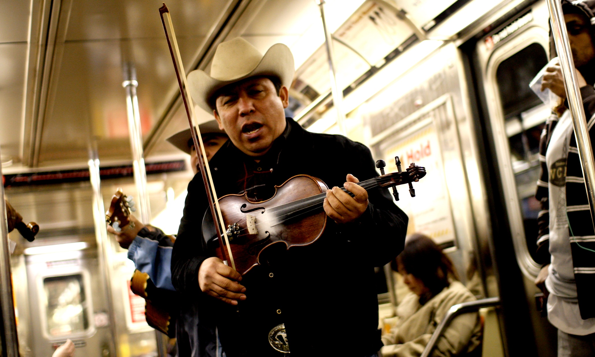 Subway busking – in New York, cops get to make the call: artist, or beggar with guitar?