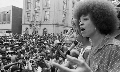 Angela Davis speaks at a street rally in Raleigh