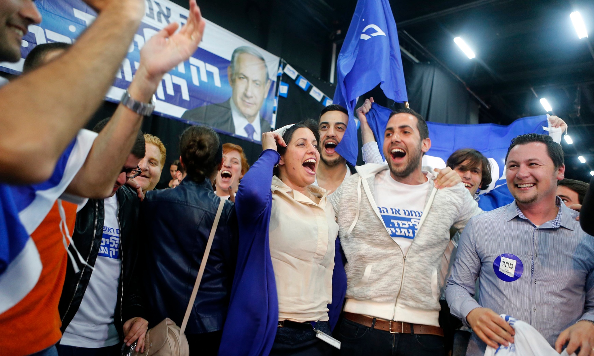 Israel elections: Netanyahu declares 'great victory' as exit polls show tie with Herzog – live updates