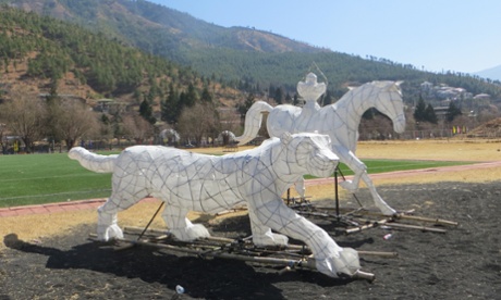 At the festival, sculptors from Cornwall created this snow leopard and horse out of bamboo and paper