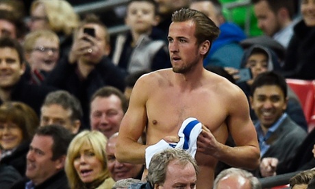Harry Kane with shirt at the ready.