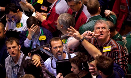 Traders work in the crude oil options pit at the New York Mercantile Exchange in New York, U.S., on  February 23, 2011. Oil surged to 0 a barrel in New York for the first time in two years as Libya's violent uprising threatened to disrupt exports from Africa's third-biggest supplier and spread to other Middle East oil producers.