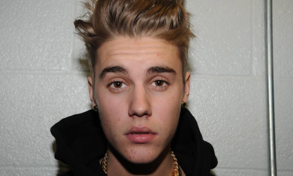 Justin Bieber issued arrest warrant from Argentina for 2013 nightclub incident - The Guardian
