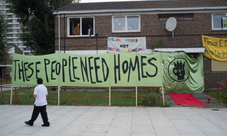 Banners outside occupied flats as members of the group, E15 Mothers staged at a sit-in in September 2014 of the almost empty Carpenters estate in Newham to highlight the lack of affordable housing in London.