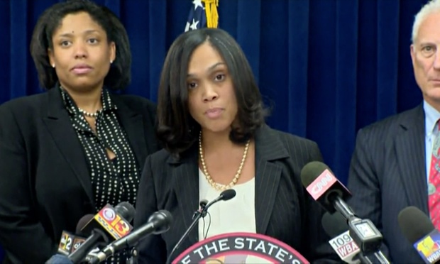 Freddie Gray grand jury brings charges against six Baltimore police – video
