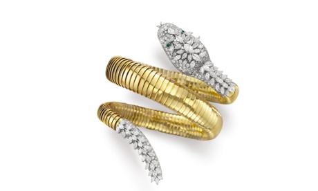 Diamond and emerald 'snake' bracelet-watch by Bulgari at the Elizabeth Taylor auction in 2011.