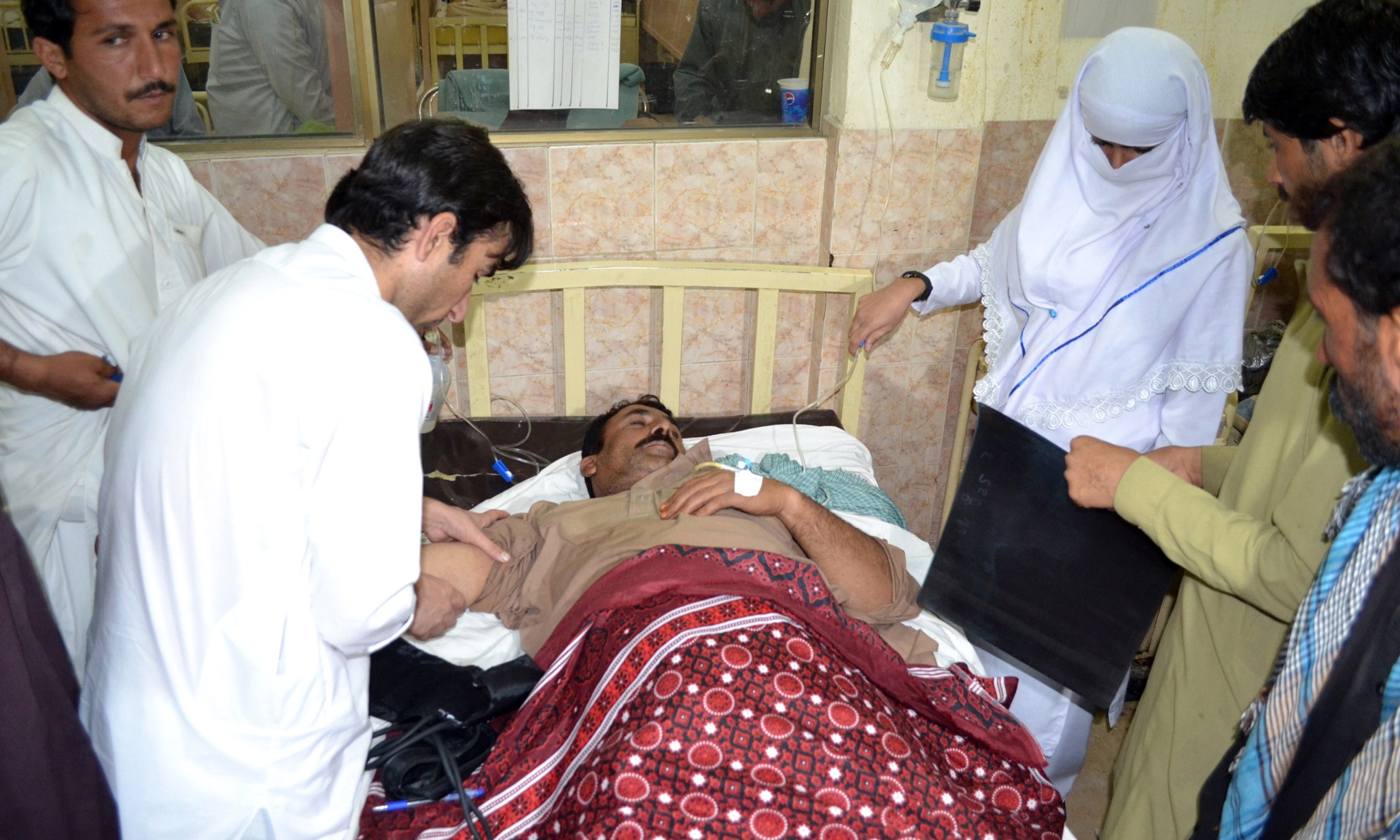 Gunmen kill at least 19 bus passengers in Pakistan