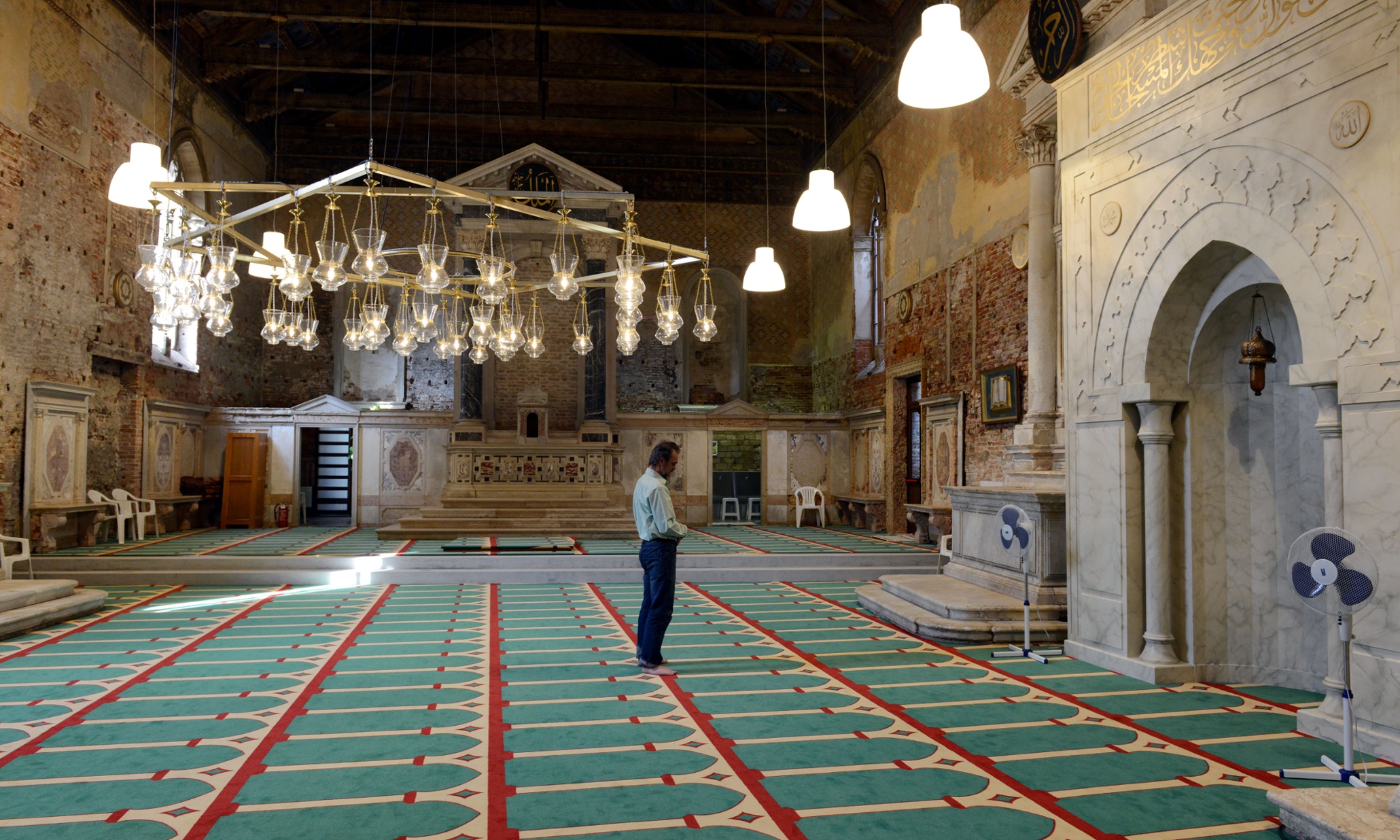 Artist draws controversy turning church into Venice's first mosque