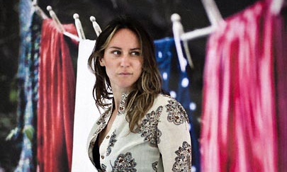 Dresses on washing lines pay tribute to Kosovo survivors of sexual violence