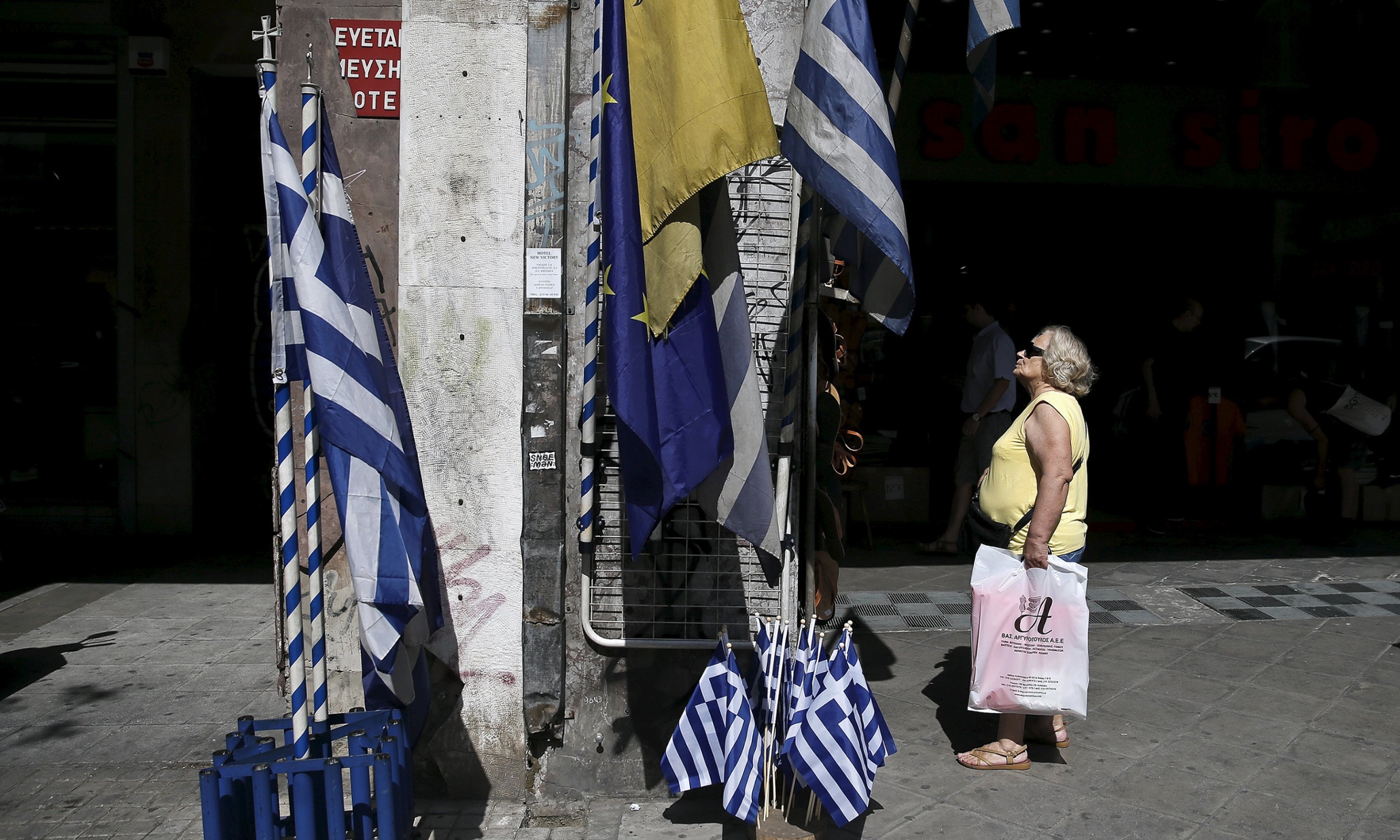 Markets slide as Greece demands end to creditor 'looting'