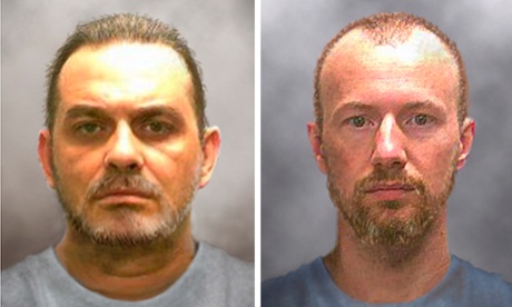 New York prison break: another officer suspended as pair remain on run