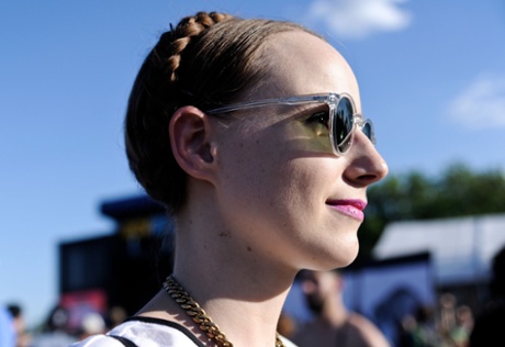 A festivalgoer with braided hair at the Governors Ball music festival in New York, 2014.