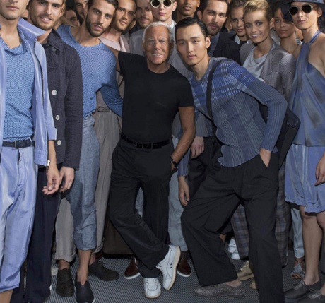The designer with models at Milan Fashion Week.