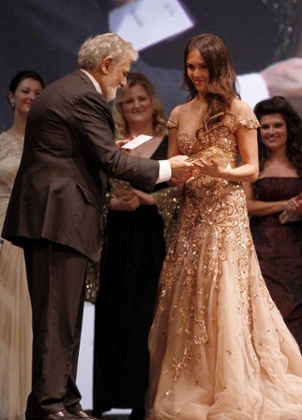 Domingo presents Aida Garifullina with 1st prize at the 2013 Operalia at the Teatro Filarmonico in Verona. Photograph: FotoENNEVI