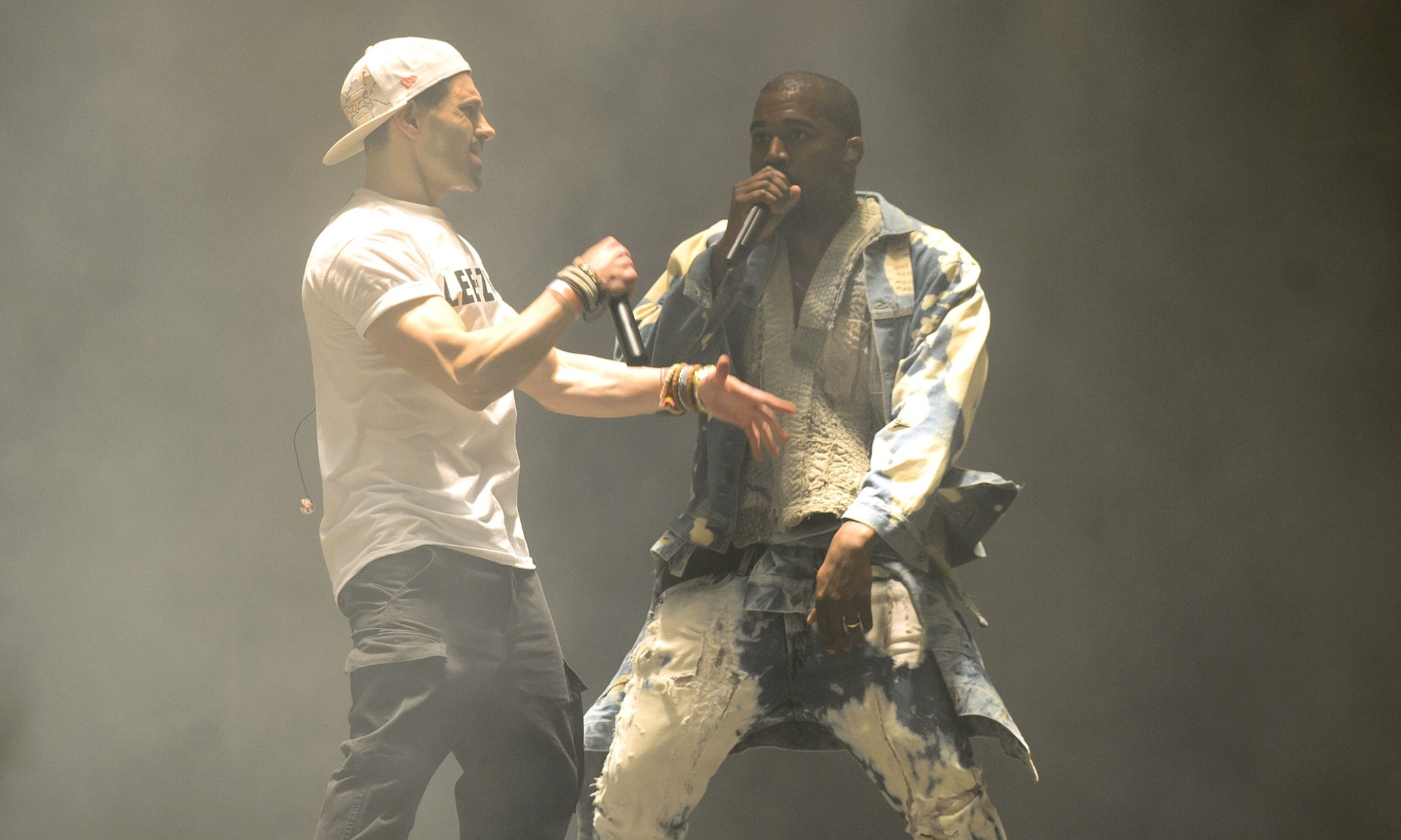 Kanye West Glastonbury headline show disrupted by comedian's stage invasion