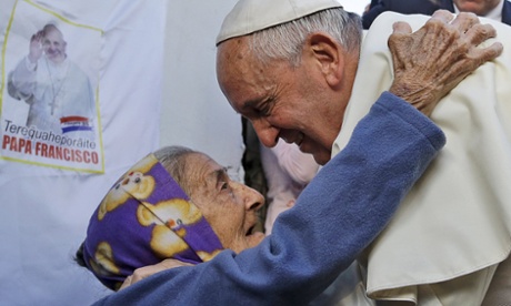 Pope Francis visits Paraguay slum to ask for struggling residents' stories