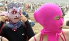 China's 'face-kini' proves popular for those averse to jellyfish stings and tans - video