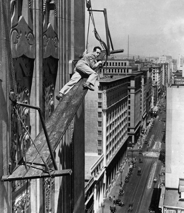 Harold Lloyd doing a very real stunt in 1931.
