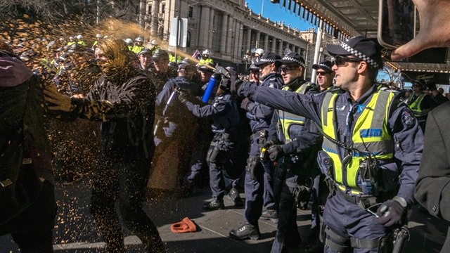 Reclaim Australia rally: Victoria police defend officer pictured with anti- Islamic protester | Victoria | The Guardian