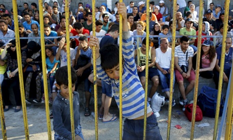 Aid worker says situation out of control as migrants locked in stadium on Kos
