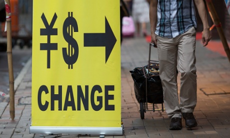 China halts yuan devaluation with slight official rise against US dollar