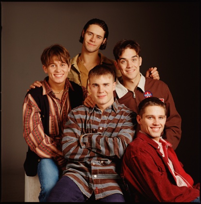 Boy band Take That posed in London in 1995 L-R Mark Owen, Howard Donald (top) Gary Barlow (bottom) Robbie Williams, Jason Orange (Photo by Mike Prior/Redferns)