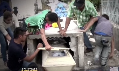 Family break open pregnant teenager's coffin over fears she was buried alive