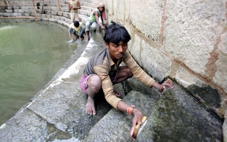 Workers carry out conservation work at Hazrat Nizamuddin Auliyas baoli in New Delhi.