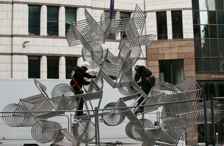 The finishing touches are put to Ai Weiwei's 'Forever', by the Gherkin building, as part of the City of London's 