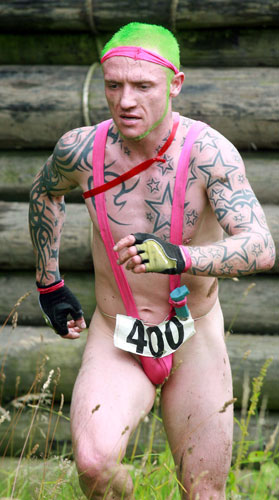 Tough Guy Competition: A competitor takes part in the Tough Guy competition dressed in a mankini