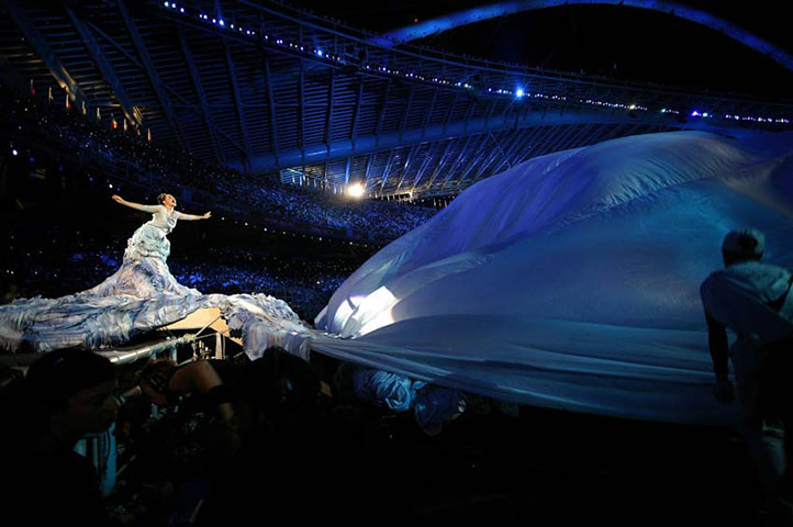 Q 300th issue: Björk performing on stage at the opening of the 2004 Athens Olympics