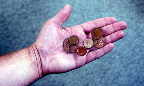 Loose-change-in-a-hand-007.jpg