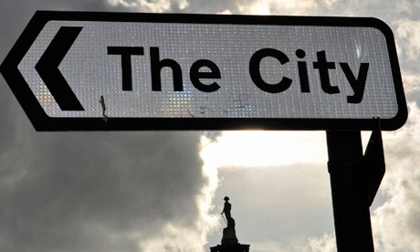 A sign points to the City of London financial district
