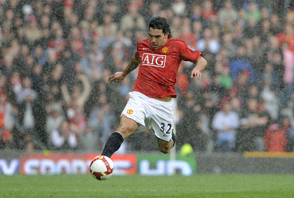 Man Utd. league champions: Carlos Tevez controls the ball