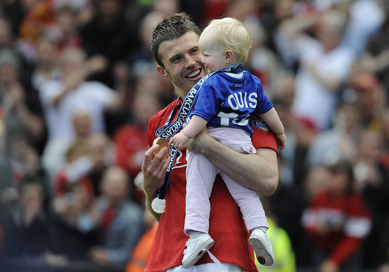 Man Utd. league champions: Michael Carrick with his daughter Louise