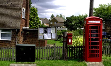 Phone box, letter box in background