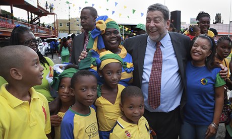 Ralph Gonsalves with schoolchildren