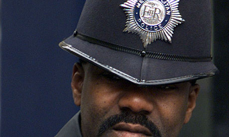 black policeman guards downing street