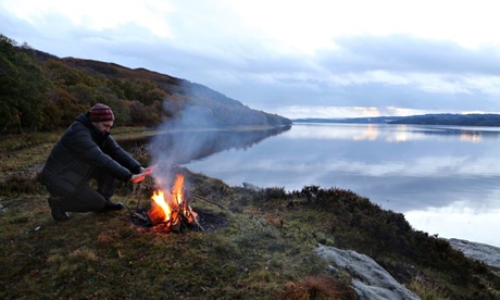Peter enjoys the campfire