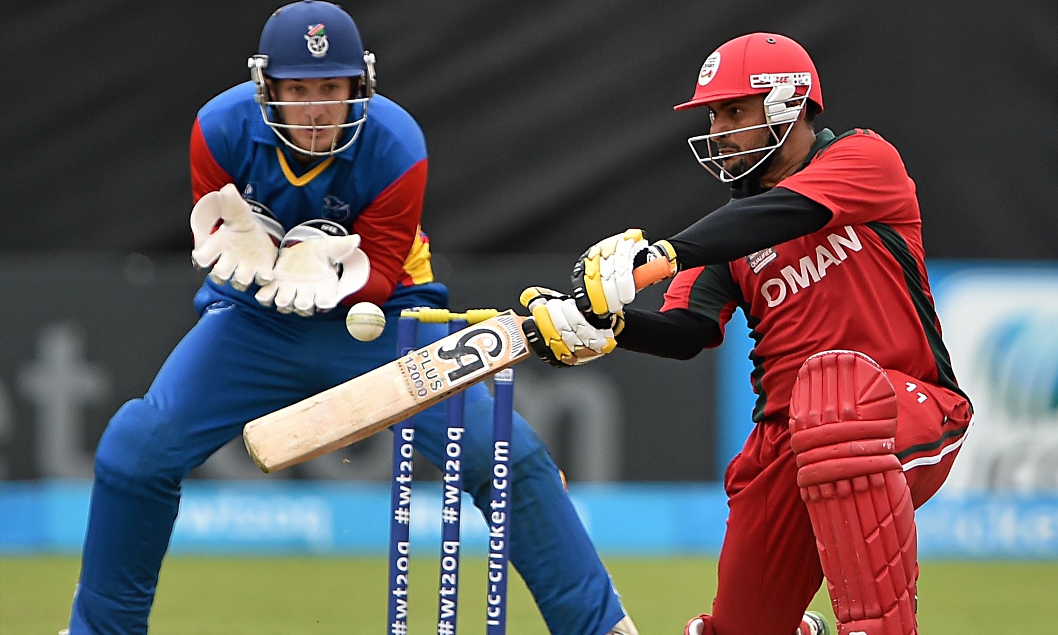 Oman reach 2016 World T20 finals with victory over Namibia