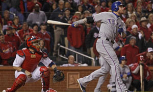 Texas Rangers' Josh Hamilton connects on a two-run home run scoring Elvis  Andrus during the 10th inning of game 6 of the World Series against the St.  Louis Cardinals at Busch Stadium